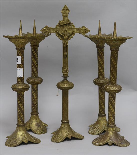 A set of four French candlesticks and crucifix
